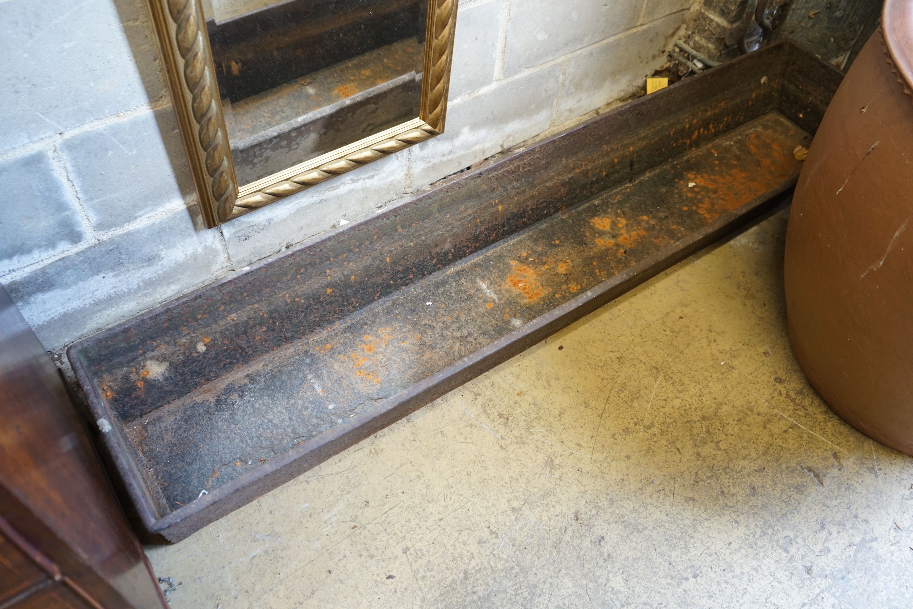 A Victorian cast iron planter trough, width 186cm depth 39cm height 20cm
